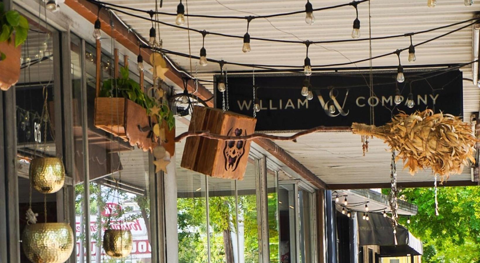 Close to the center of everything a store front with a sign