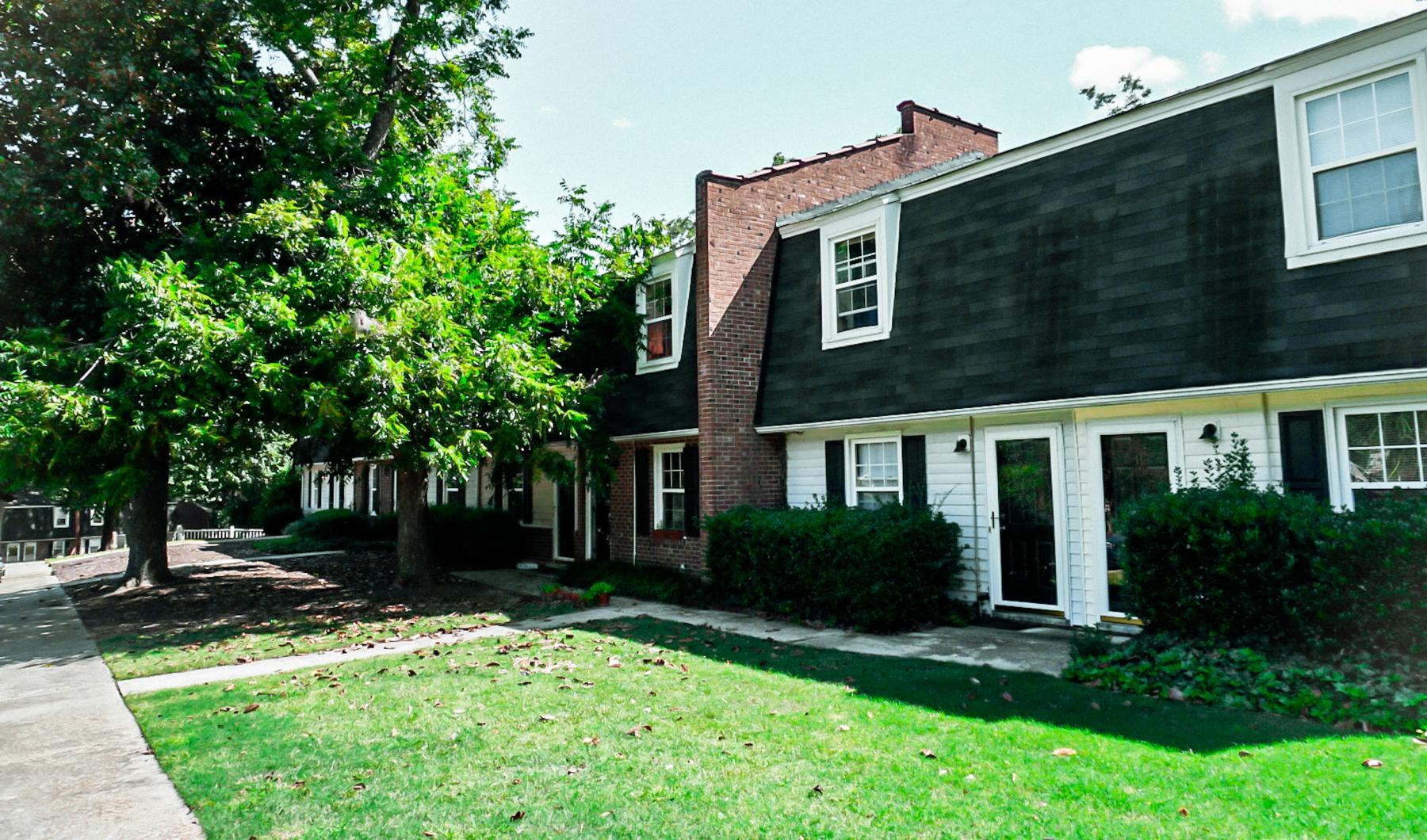 A perfect fit for the whole family an apartment with a lawn and trees
